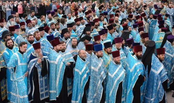 orthodox priests in blue